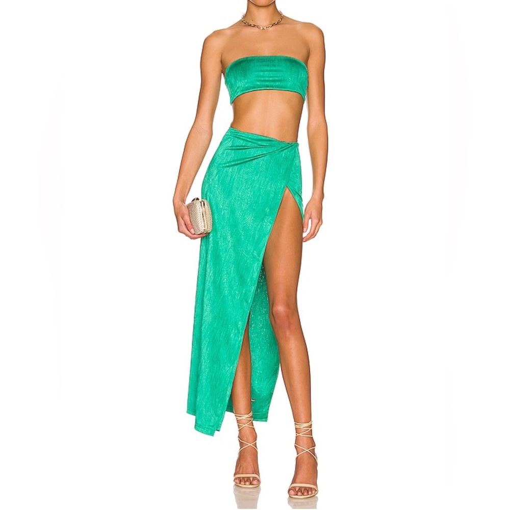 Worn once - small stain on front (see photo). Bralette/top & skirt sold together